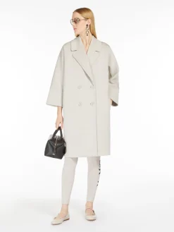 Double-breasted coat in scuba jersey