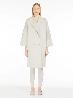 Double-breasted coat in scuba jersey