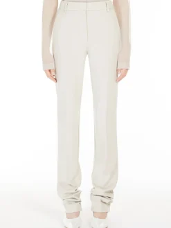 Fitted trousers in crêpe jersey