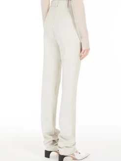 Fitted trousers in crêpe jersey