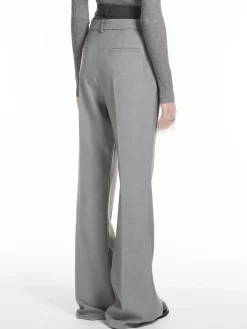 Flared trousers with a branded double belt
