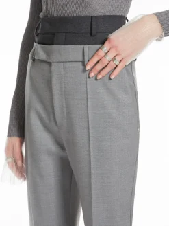 Flared trousers with a branded double belt