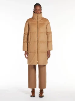 Long, reversible camel colour down jacket