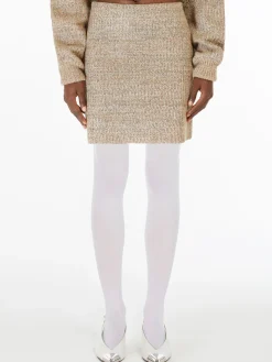 Mini skirt in knit fabric with rubber-coated yarn