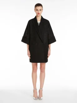 Oversized coat in mesh jersey