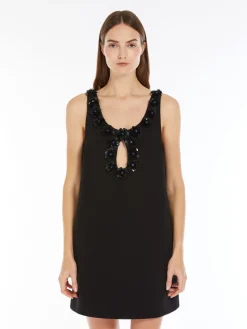 Short dress in embroidered sablé