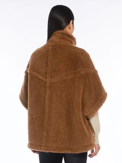 Teddy fabric cape with straps