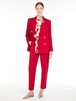 Wool satin carrot-leg trousers.