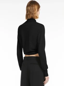 Wool sweater with crossover drape detail